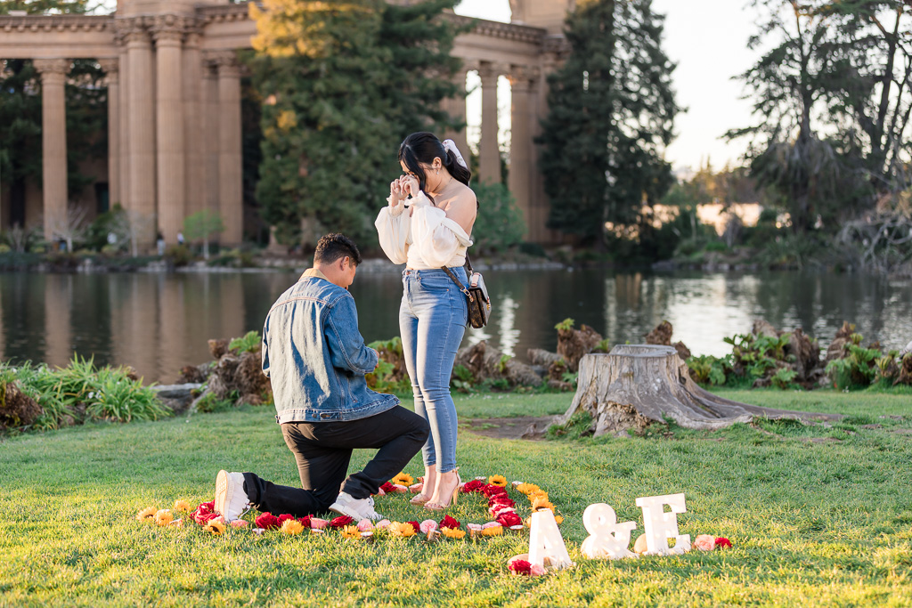 wiping happy tears away after surprise proposal