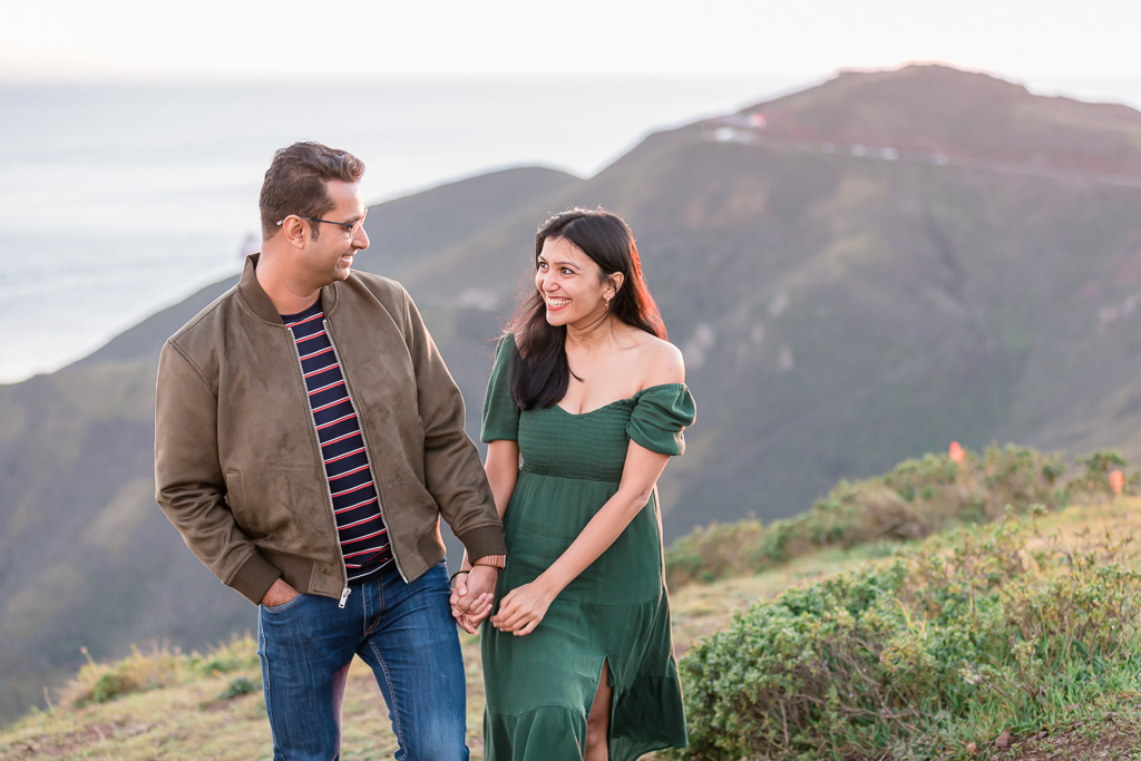 engagement photos in the mountains with green grass