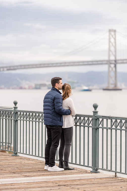 couple looking at the Bay Bridge