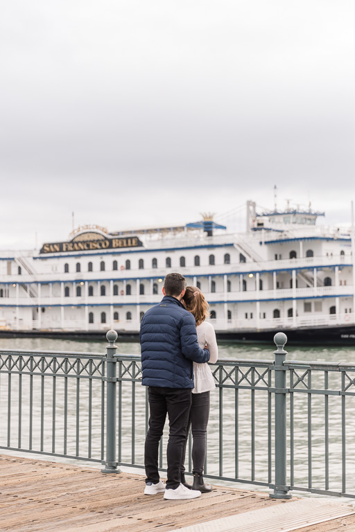couple standing in front of the San Francisco Belle boat