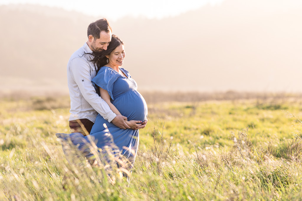 San Francisco romantic maternity session in a green field