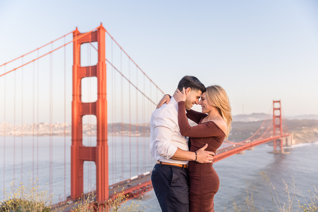 engagement photo in front of iconic golden gate bridge