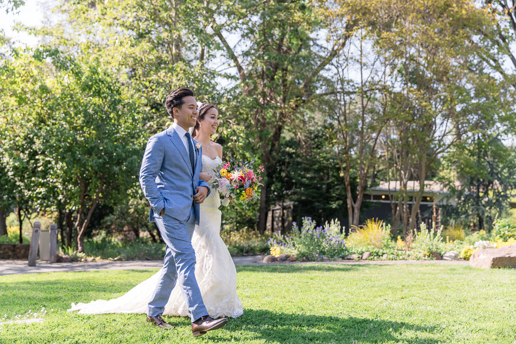 bride and groom walking into wedding together symbolizing equality
