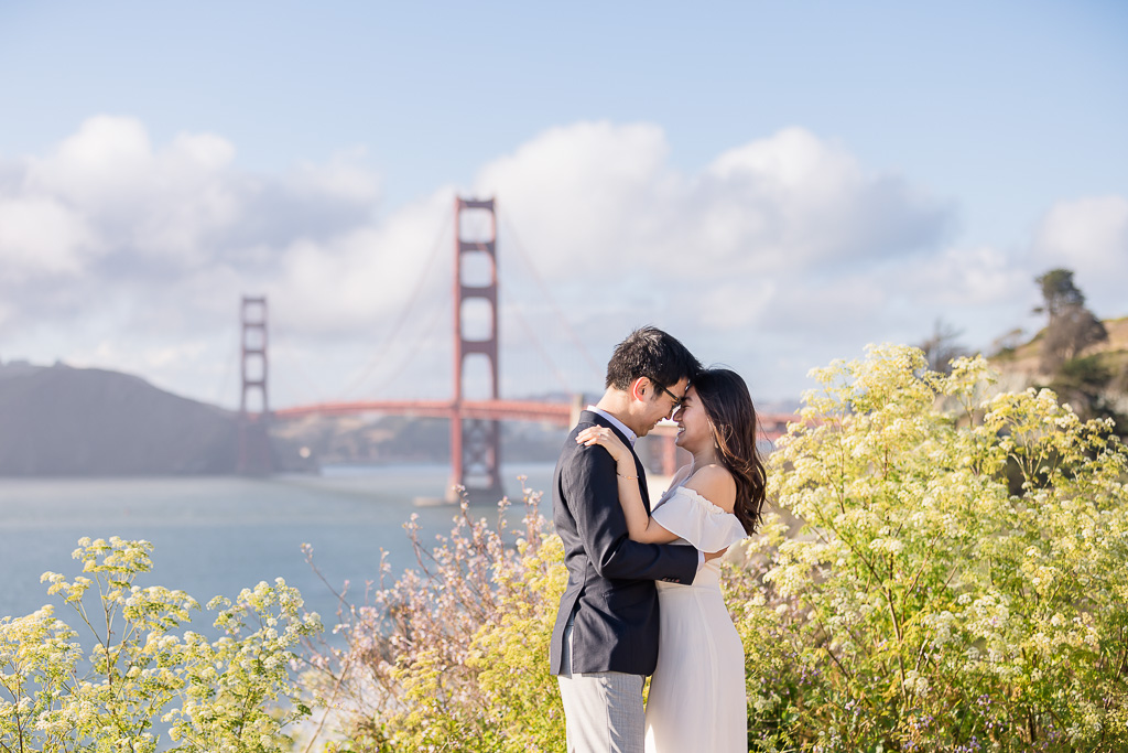 Golden Gate Bridge engagement photos by the ocean
