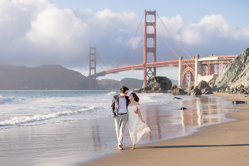 beach engagement photos with Golden Gate Bridge background