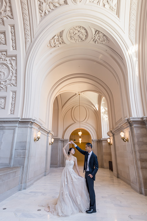 wide angle twirling dancing shot at San Francisco City Hall