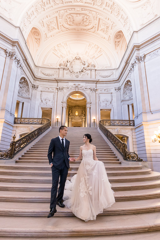 wedding portraits on the grand staircase at SF City Hall