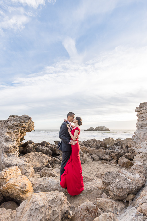 engagement photo on rocks by the ocean