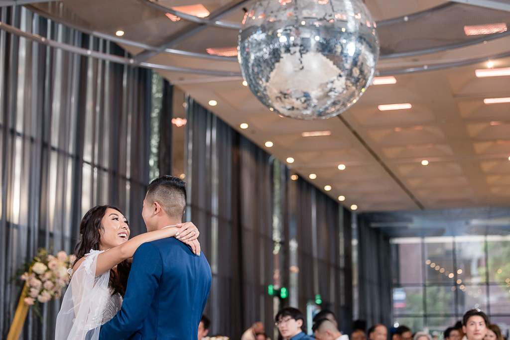 bride/groom first dance at The GlassHouse SJ under disco ball
