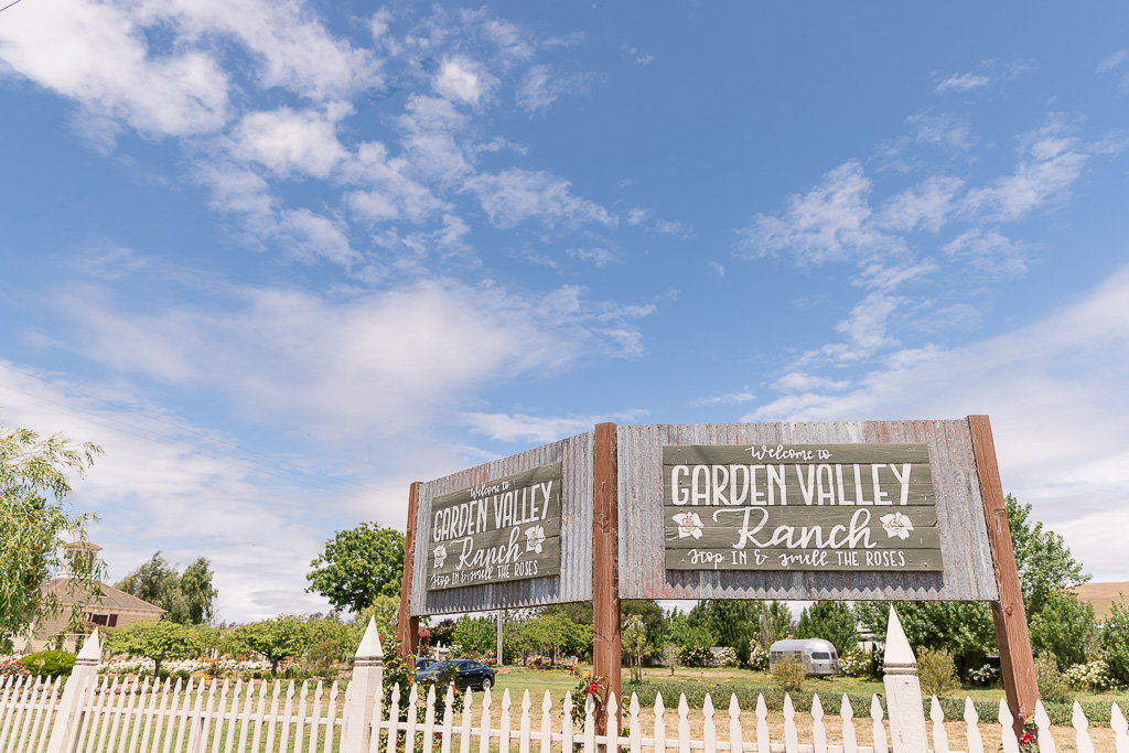 wooden Garden Valley ranch sign outside venue entrance