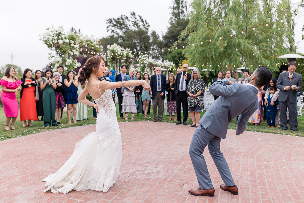 bride and groom dance battle