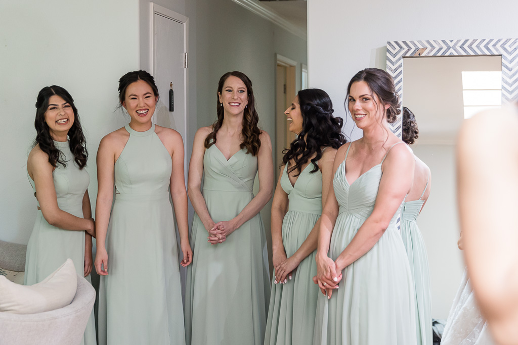 bridesmaids in sage green dresses