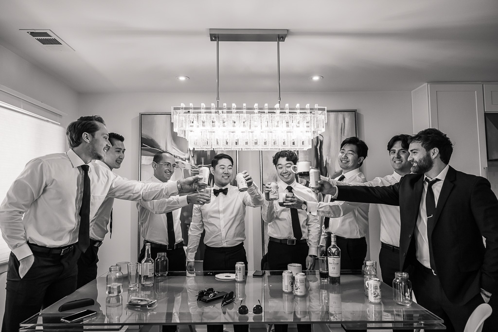 groomsmen sharing a drink