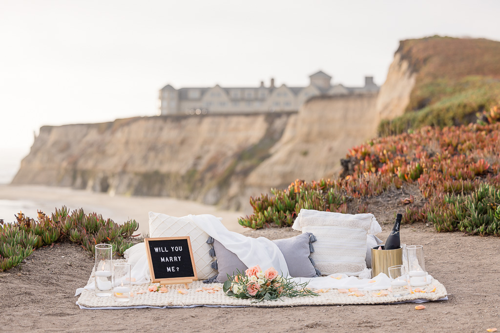 romantic sunset picnic decor for surprise engagement by Experience by K