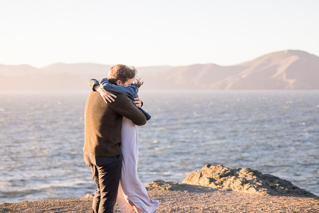 happy hugs during engagement shoot