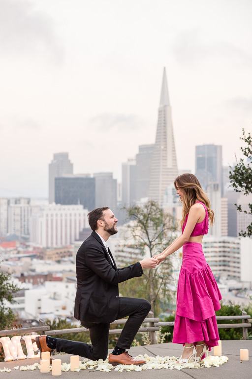 San Francisco hidden proposal photographer at Ina Coolbrith Park with Transamerica Pyramid in the background