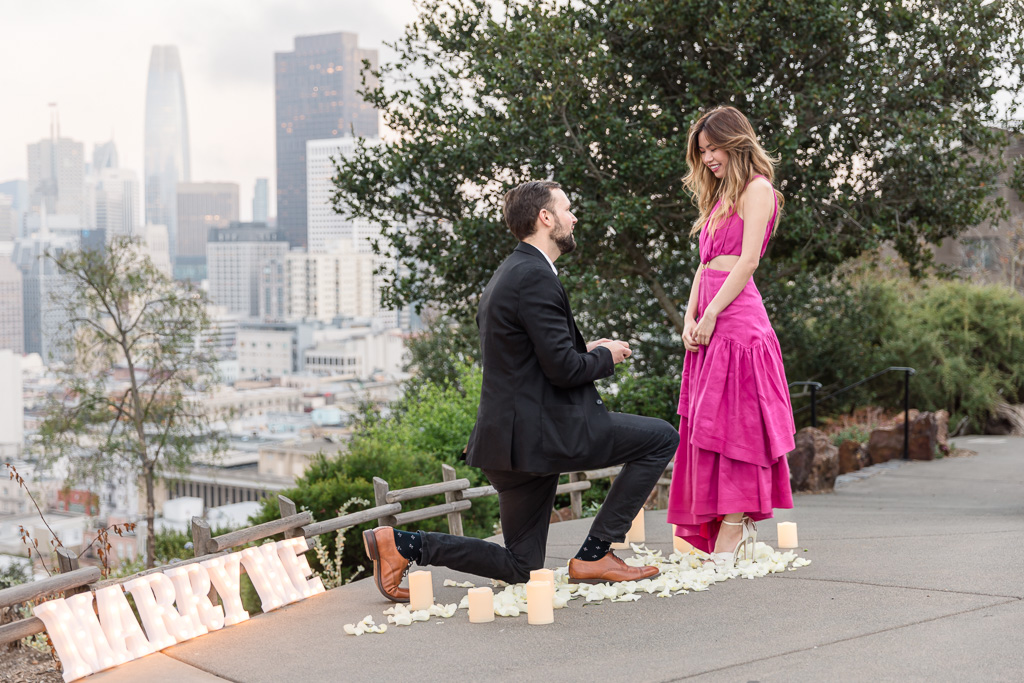 Salesforce Tower in the background of proposal photos
