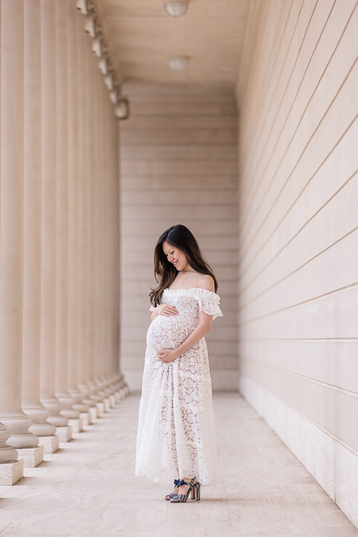 maternity session in white lace dress