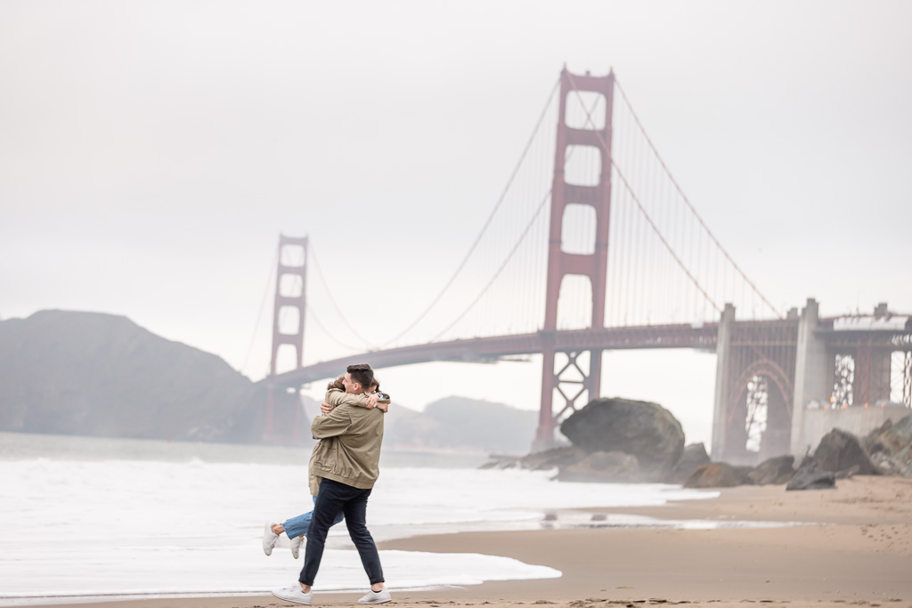surprise engagement at the Golden Gate Bridge beach