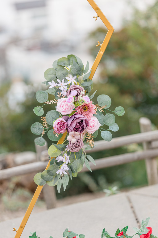 hexagonal wedding arbor with floral decor