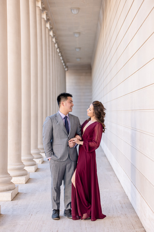 formal style engagement photos at the Legion of Honor covered walkway