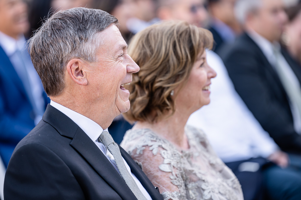 parents laughing during the ceremony