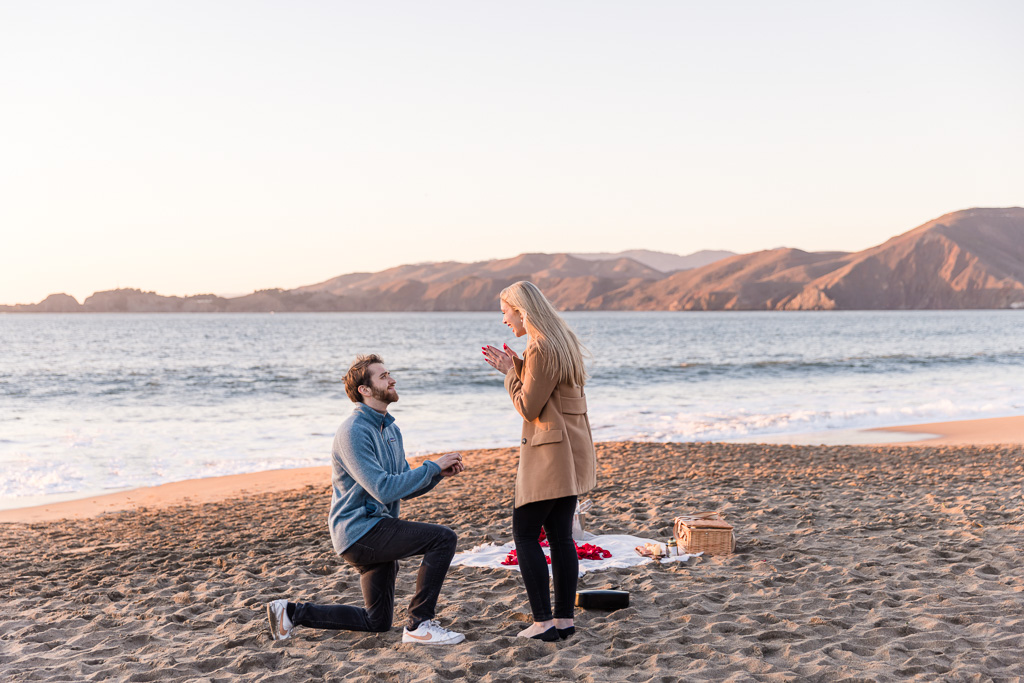 surprise engagement on the beach