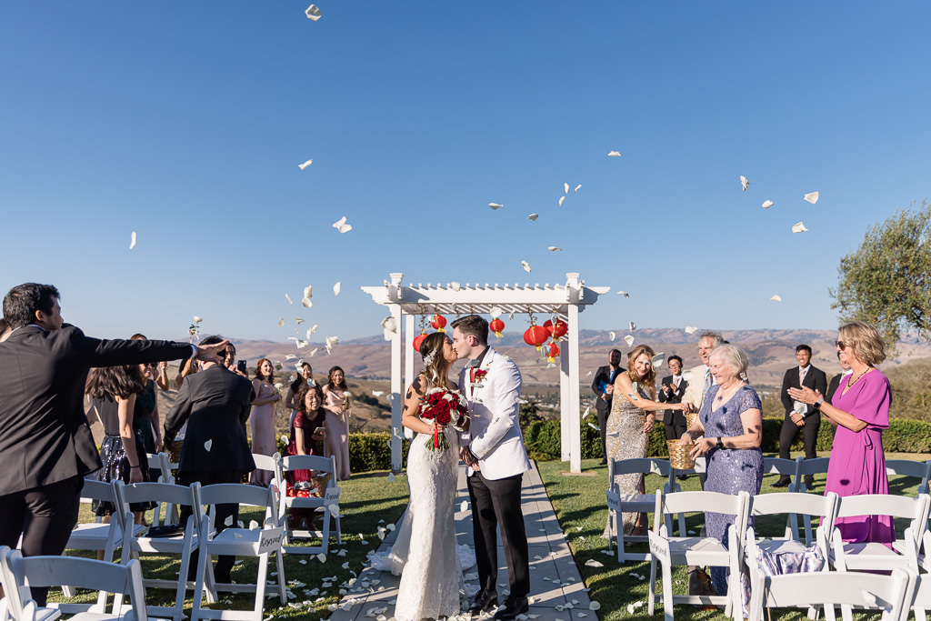 Willow Heights Mansion wedding recesisonal with white flower petal toss