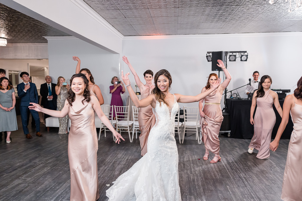 bride and bridesmaids surprise choreographed dance
