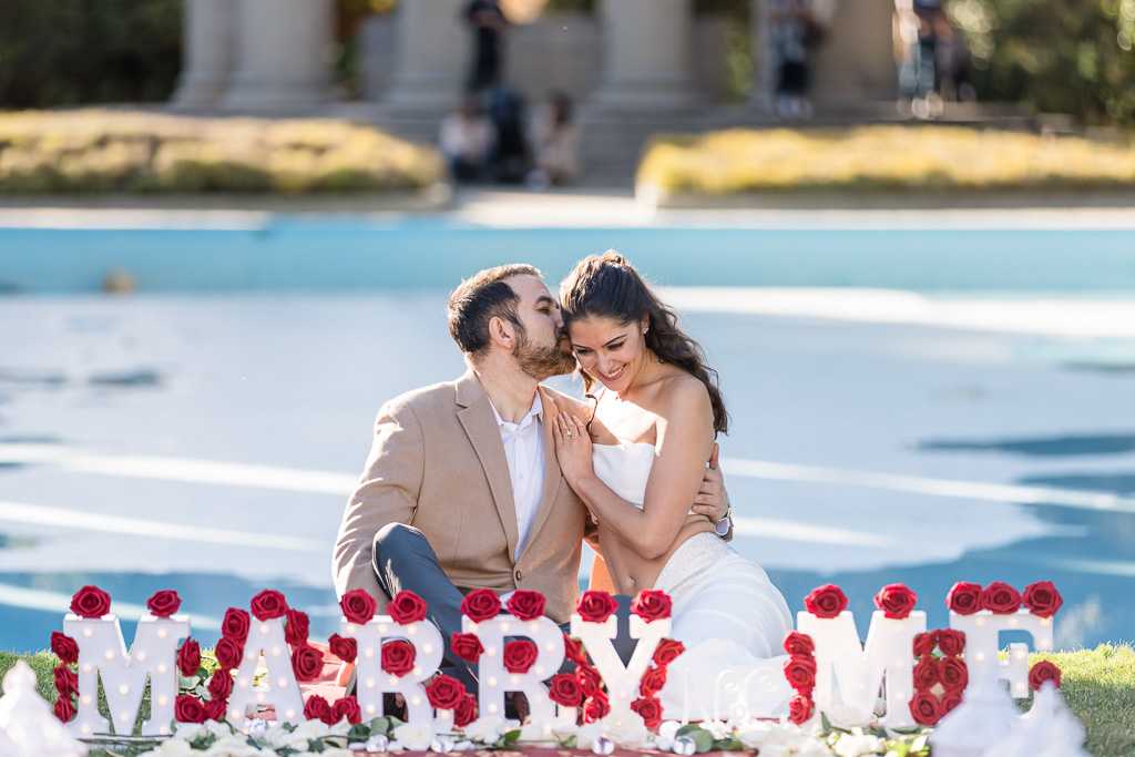 proposal engagement photo shoot at Pulgas Water Temple in front of the pool