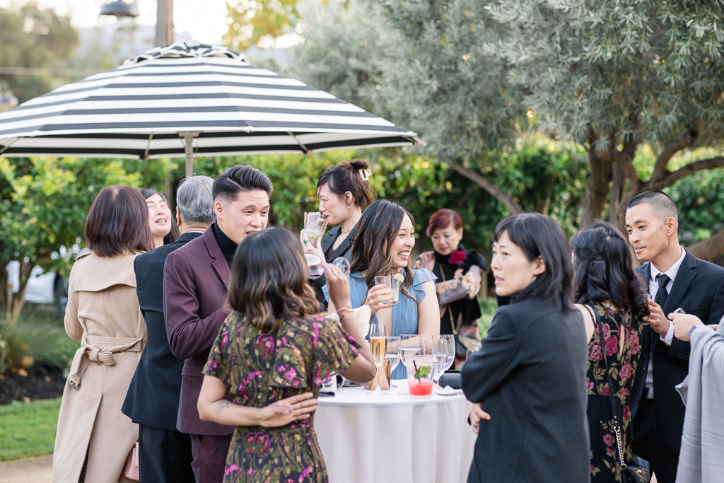 wedding guests mingling during cocktail hour at The Garden Grove