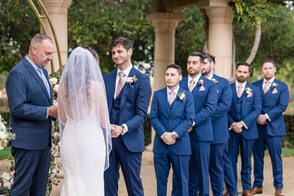groom and groomsmen during wedding ceremony