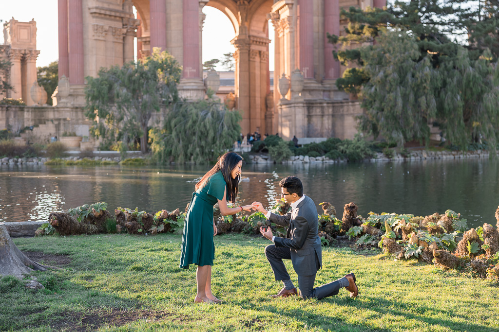 surprise proposal reaction photos by hidden photographer at the Palace of Fine Arts