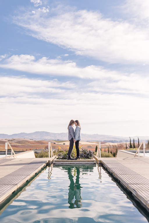stunning symmetry in lesbian engagement photos at Napa winery
