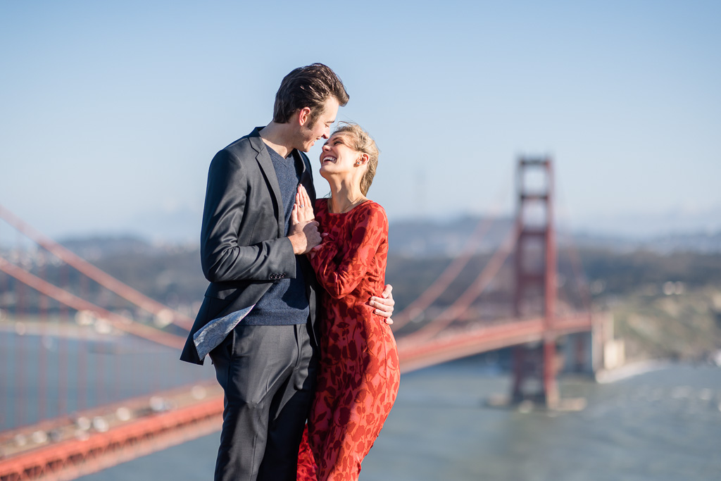 engagement photo with a big Golden Gate Bridge background