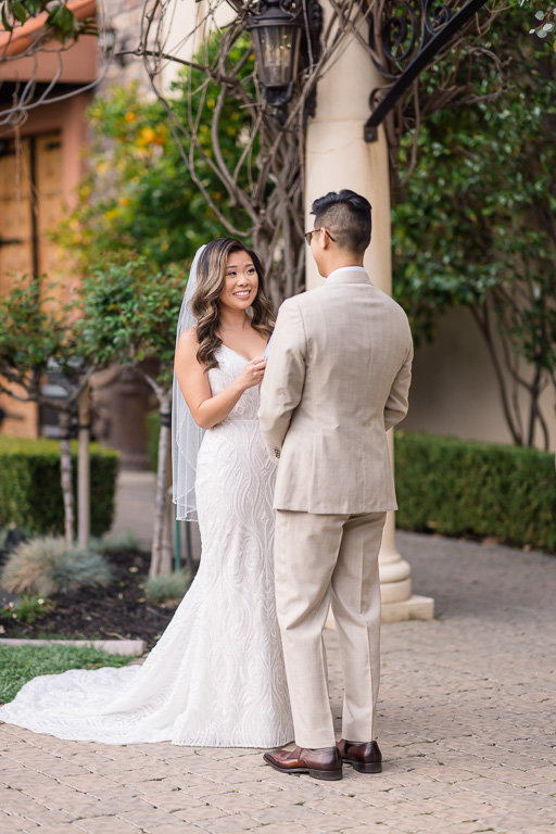 bride reading her vows at Casa Real courtyard