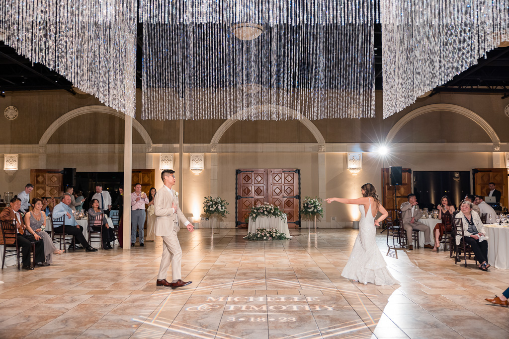 Casa Real first dance under the grand chandelier