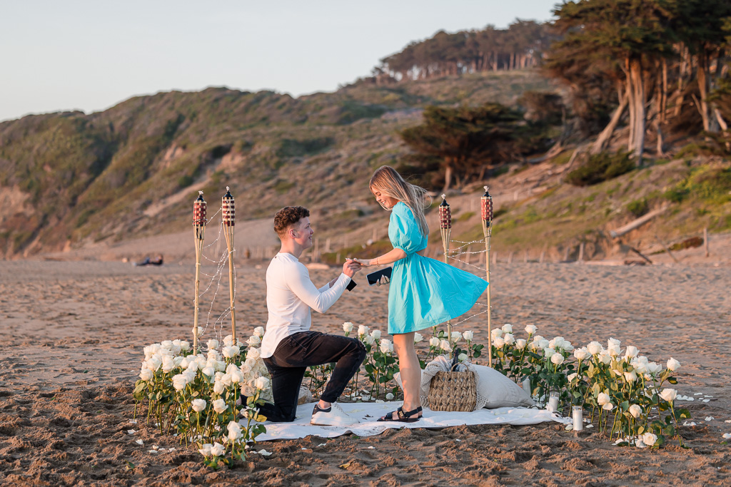beach surprise proposal at sunset