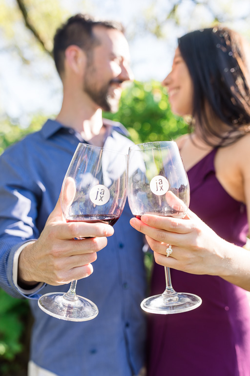 couple holding wine glasses