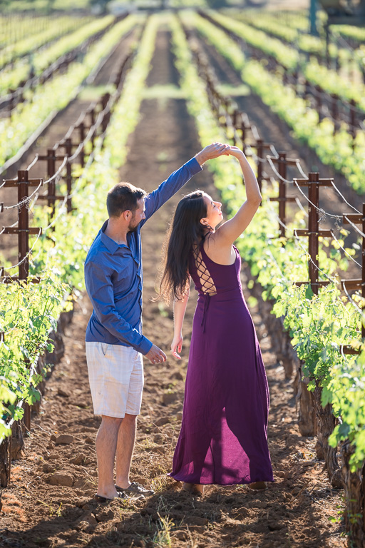 dancing engagement photos in the vineyards