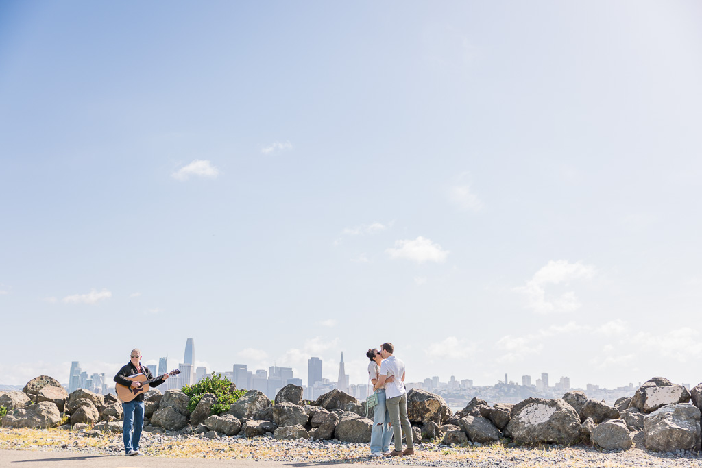 Treasure Island afternoon proposal with a guitarist