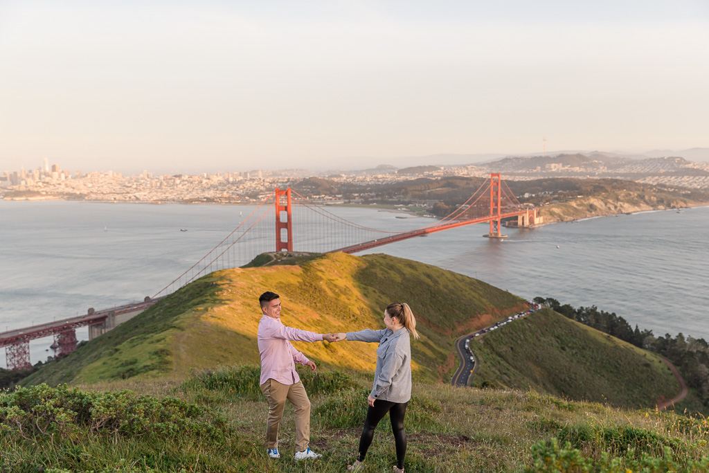 dancing in front of the Golden Gate Bridge