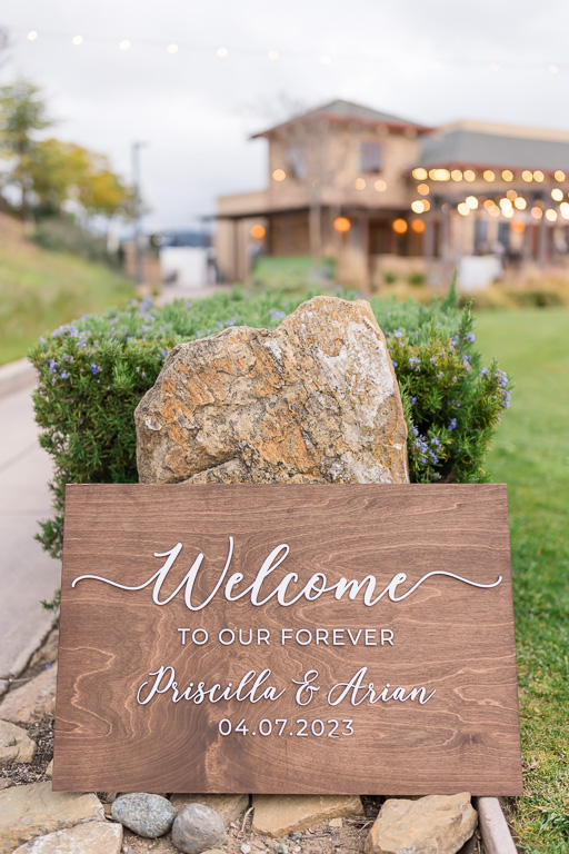 wooden wedding welcome sign with calligraphy