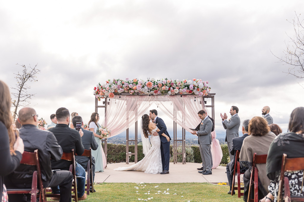 first kiss at Boulder Ridge by Wedgewood weddings in San Jose
