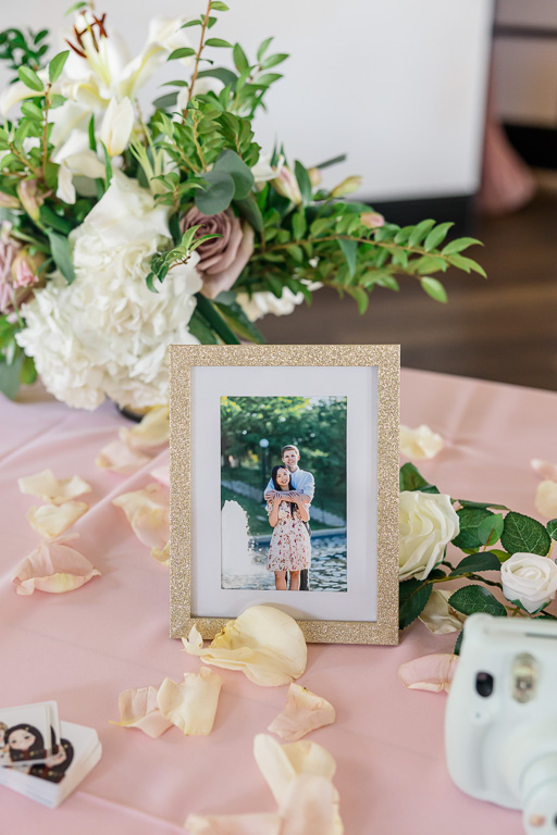 wedding welcome table with engagement photo print