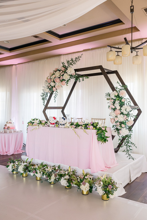 wedding reception sweetheart table hexagon decor