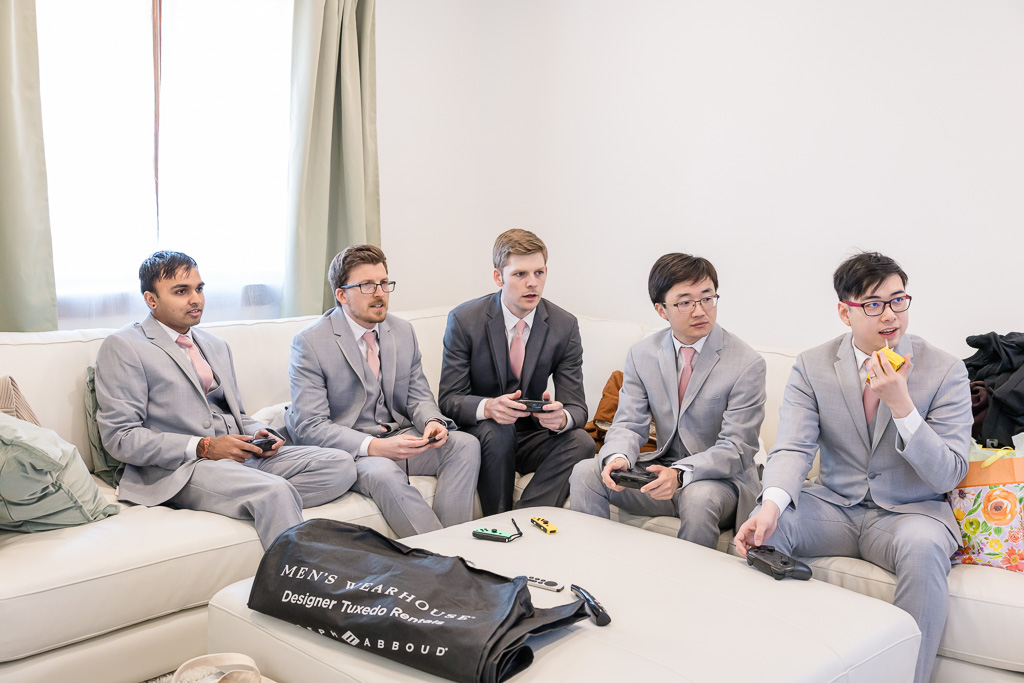 groom’s party intensely playing video games