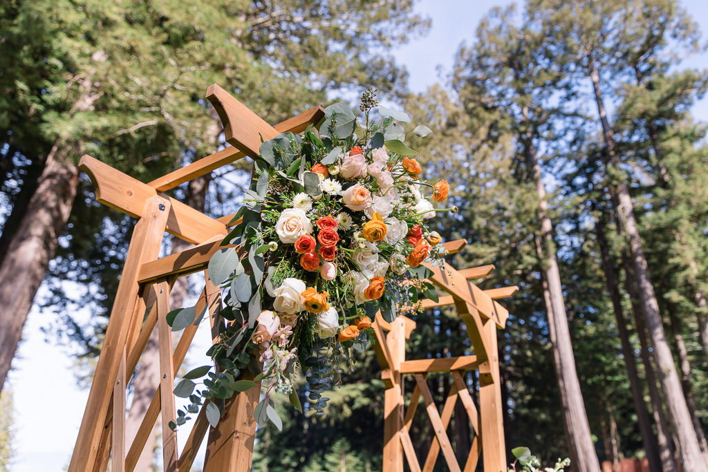 wedding arbor with floral decor by C&M Fleuri