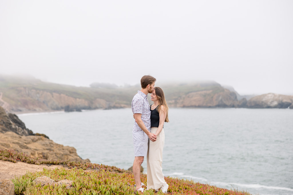 cute foggy weather engagement photos