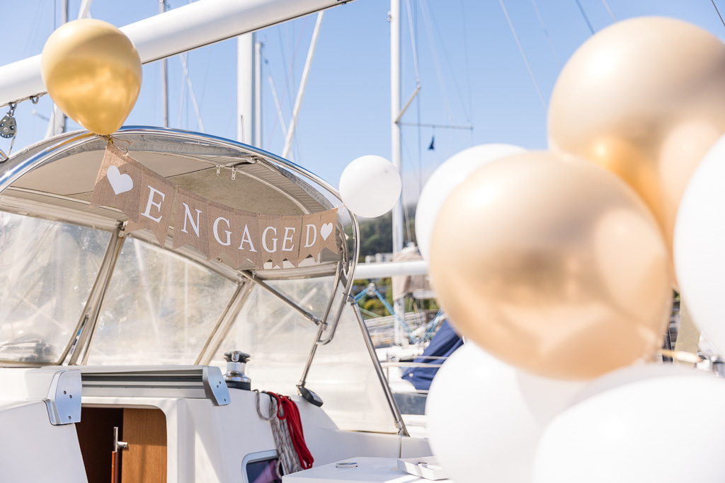 engagement party decorations with balloons on a sailboat